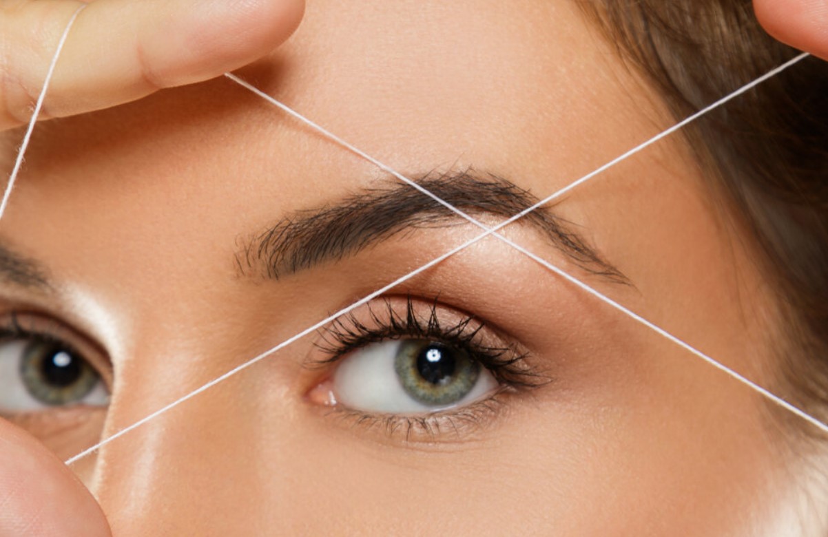 Eyebrows threading